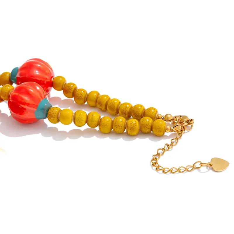 Vibrant Ceramic Pumpkin Charm Necklace – Waterproof Handmade Beaded Jewelry - Image 4